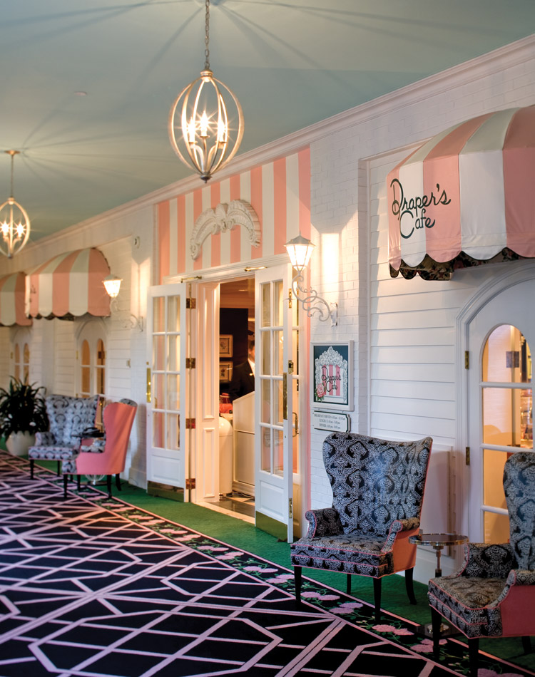 The Greenbrier's vivid colors, bold floral motifs, and black-and-white checkerboard-patterned floors create a grand yet welcoming environment.