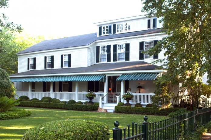 The Charlotte Inn, a historic property, serenely awaits visitors with its updated brilliant white paint and carefully tended lawns.