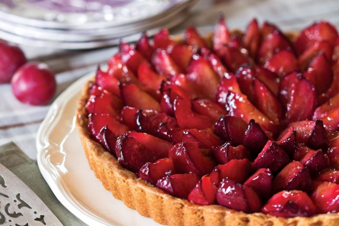 Our Plum-and-Caramel Tart will not be soon forgotten with its luscious peaks of fruit atop layers of almond filling and caramel topping over a crisp crust.