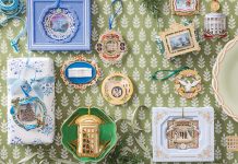 Historic Holiday Decor: White House ornaments viewed from above, atop a green-and-white paper surface, a collection of White House ornaments is carefully displayed.