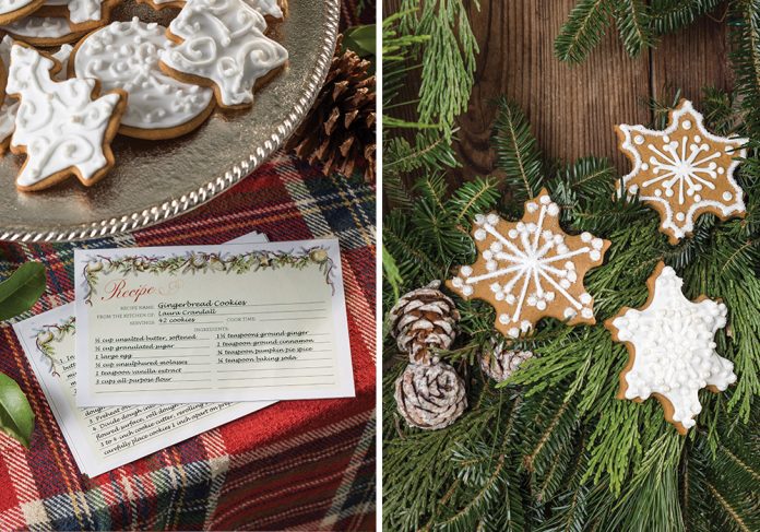 Left: Our exclusive Victoria recipe card features the recipe for our Gingerbread Cookies. Right: The cookies themselves sit atop evergreen branches, iced to look like snowflakes.
