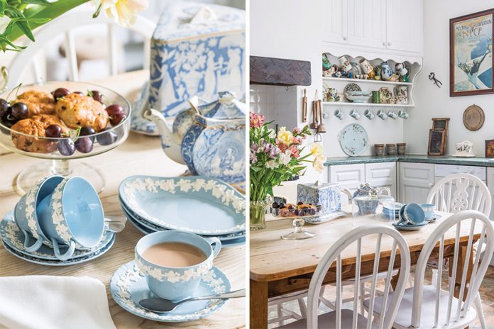 A bright and airy kitchen boasts cottage charm and beautiful blue-and-white Wedgwood china.
