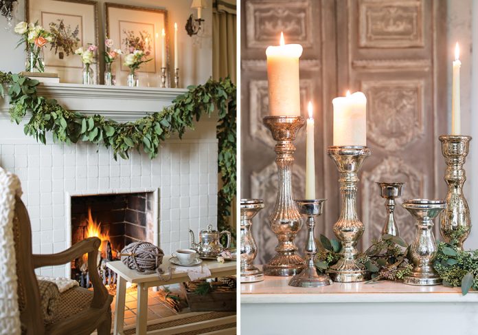 The mantel, often dressed in Christmas stockings, now bears simple evergreen garland and silver candlesticks.